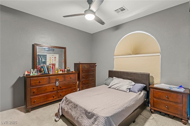 2244 Manosque Ln, Henderson, NV 89044 - bedroom with visible vents, a ceiling fan, and carpet
