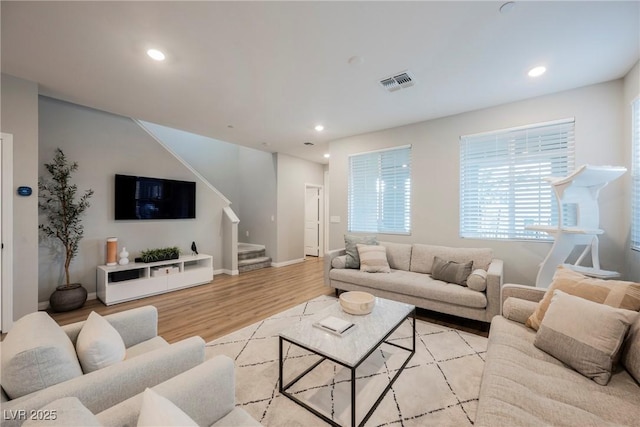 3525 Serravalle Ln, Henderson, NV 89044 - living area featuring stairs, light wood-type flooring, recessed lighting, and baseboards