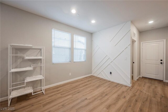 3525 Serravalle Ln, Henderson, NV 89044 - spare room with wood finished floors, baseboards, and recessed lighting