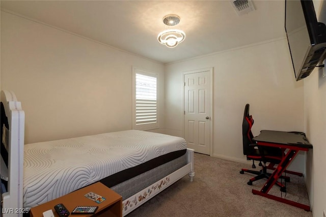 bedroom featuring ornamental molding, visible vents, and carpet floors