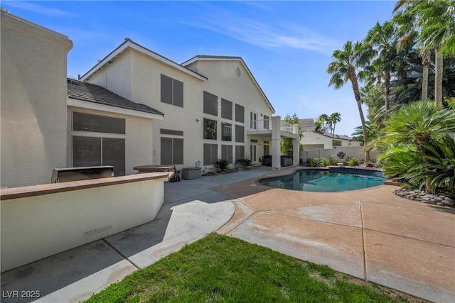 7460 Grassy Field Ct, Las Vegas, NV 89131 - view of swimming pool with a patio and a fenced backyard