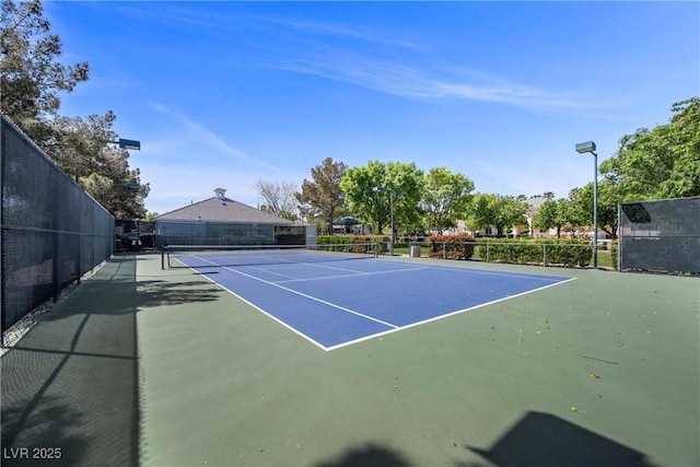 7460 Grassy Field Ct, Las Vegas, NV 89131 - view of tennis court with community basketball court