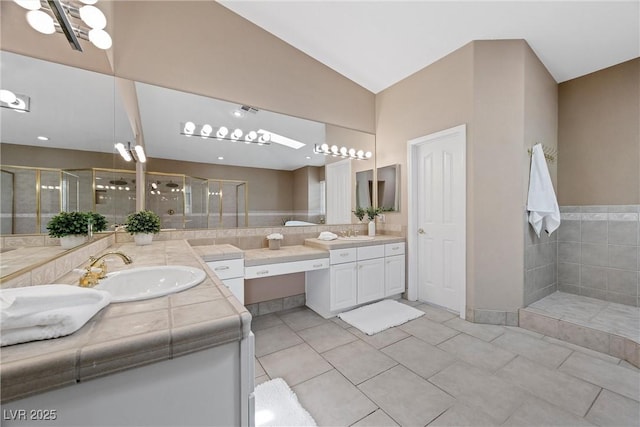7460 Grassy Field Ct, Las Vegas, NV 89131 - full bath with a stall shower, vanity, tile patterned floors, and lofted ceiling