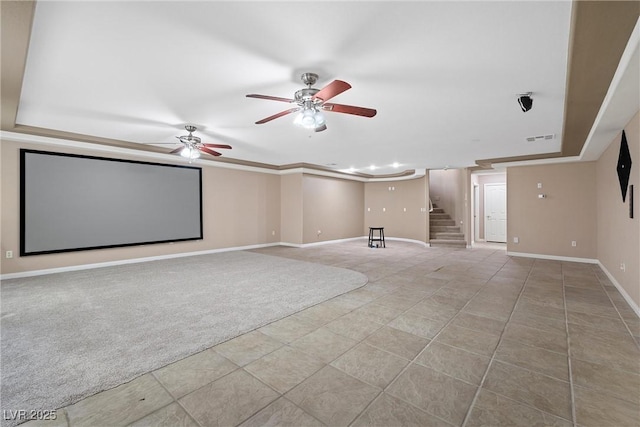 7460 Grassy Field Ct, Las Vegas, NV 89131 - tiled cinema room featuring baseboards, a ceiling fan, ornamental molding, and a raised ceiling