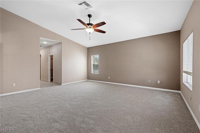 7460 Grassy Field Ct, Las Vegas, NV 89131 - empty room featuring a ceiling fan, baseboards, light colored carpet, and vaulted ceiling