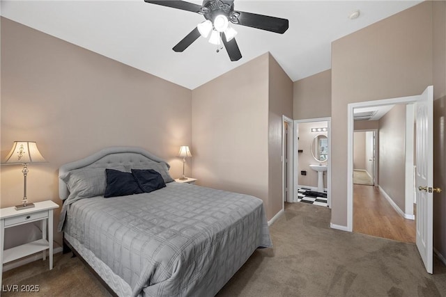 7460 Grassy Field Ct, Las Vegas, NV 89131 - bedroom featuring carpet, baseboards, lofted ceiling, a ceiling fan, and a sink