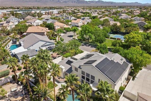 7460 Grassy Field Ct, Las Vegas, NV 89131 - aerial perspective of suburban area featuring a pool and mountains