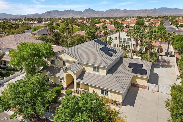 7460 Grassy Field Ct, Las Vegas, NV 89131 - aerial perspective of suburban area with a mountain backdrop