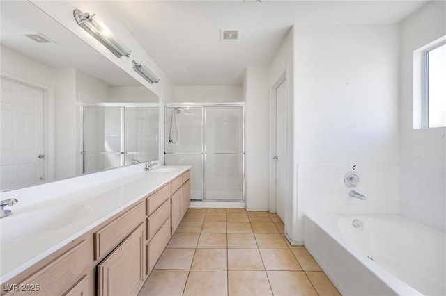 2195 Merano Ct, Las Vegas, NV 89123 - bathroom featuring a shower stall, a sink, tile patterned flooring, and visible vents