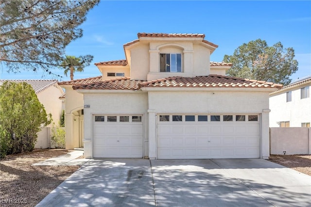 2195 Merano Ct, Las Vegas, NV 89123 - mediterranean / spanish-style house with driveway, stucco siding, fence, and a tile roof