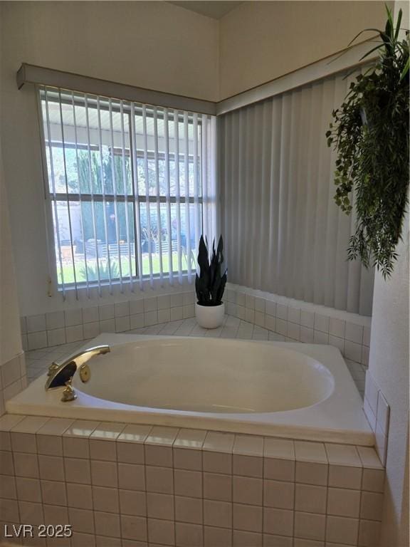 full bath with a garden tub