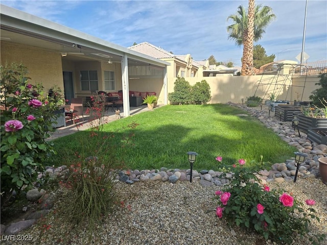 view of yard featuring a patio and fence