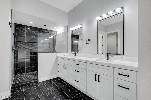 2110 S Manzanita Dr, Pahrump, NV 89048 - bathroom with a walk in shower, a sink, marble finish floor, and double vanity