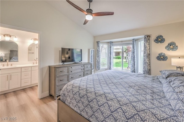 8513 Glenmount Dr, Las Vegas, NV 89134 - bedroom with light wood-style floors, high vaulted ceiling, ceiling fan, connected bathroom, and a sink