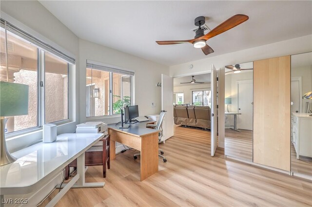 8513 Glenmount Dr, Las Vegas, NV 89134 - office area with light wood-type flooring and ceiling fan