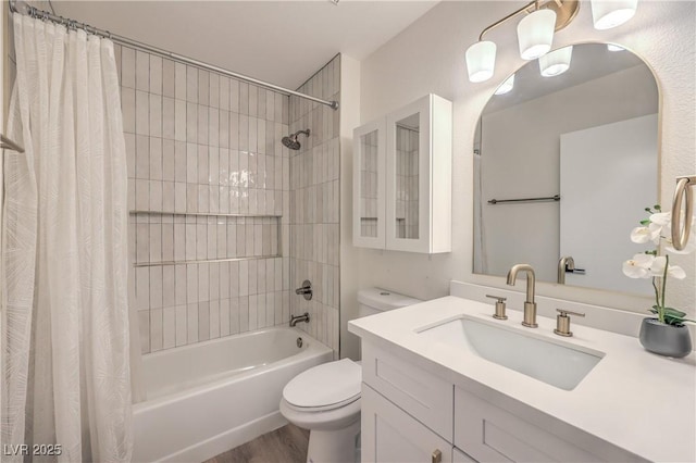 8513 Glenmount Dr, Las Vegas, NV 89134 - full bath with toilet, shower / bathtub combination with curtain, vanity, and wood finished floors