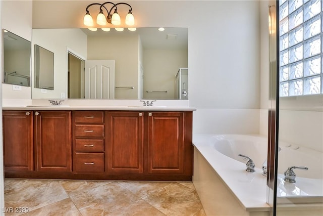 2229 Suffron Hills Ct, Henderson, NV 89044 - full bathroom featuring a sink, double vanity, a stall shower, and a garden tub