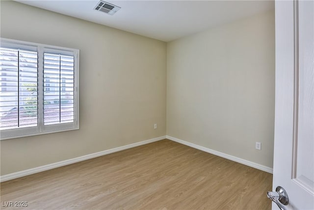 2229 Suffron Hills Ct, Henderson, NV 89044 - spare room featuring light wood-style flooring, baseboards, and visible vents
