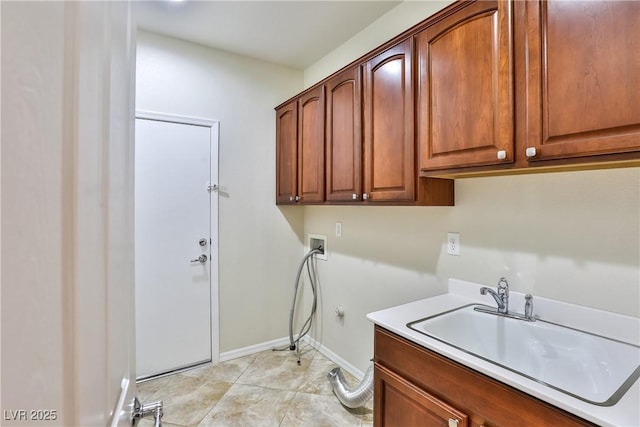 2229 Suffron Hills Ct, Henderson, NV 89044 - clothes washing area featuring baseboards, hookup for a gas dryer, hookup for a washing machine, cabinet space, and a sink