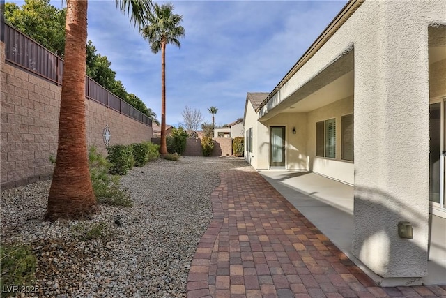 2229 Suffron Hills Ct, Henderson, NV 89044 - view of yard with a fenced backyard and a patio