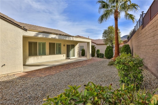 2229 Suffron Hills Ct, Henderson, NV 89044 - rear view of house with a patio area and stucco siding