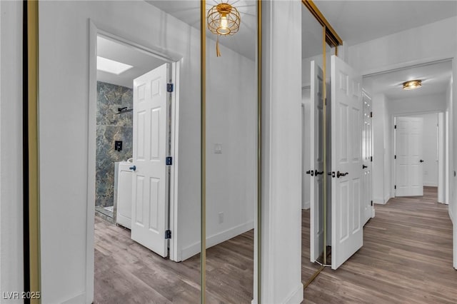 2851 S Valley View Blvd Unit 1098, Las Vegas, NV 89102 - hall featuring wood finished floors and baseboards