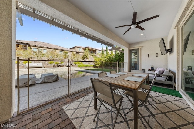12665 Cooks Bay Ct, Las Vegas, NV 89141 - balcony with outdoor dining space, a patio, and ceiling fan