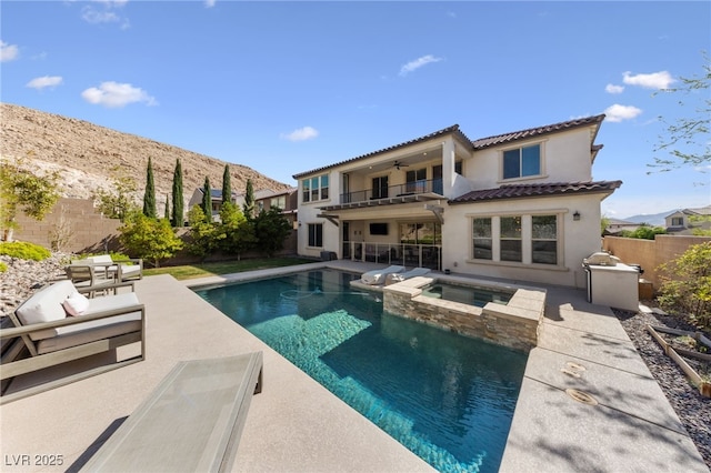 12665 Cooks Bay Ct, Las Vegas, NV 89141 - rear view of property with ceiling fan, a fenced backyard, stucco siding, a patio, and a balcony