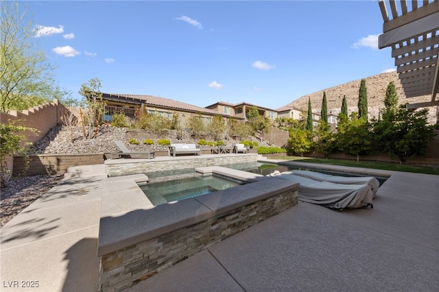 12665 Cooks Bay Ct, Las Vegas, NV 89141 - view of swimming pool with a patio, an in ground hot tub, and a fenced backyard