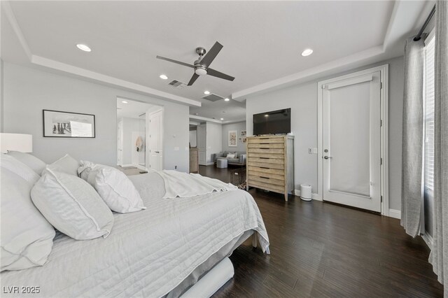 12665 Cooks Bay Ct, Las Vegas, NV 89141 - bedroom featuring visible vents, recessed lighting, a raised ceiling, and dark wood-style floors