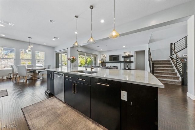 12665 Cooks Bay Ct, Las Vegas, NV 89141 - kitchen with visible vents, dishwasher, a sink, open floor plan, and dark cabinetry