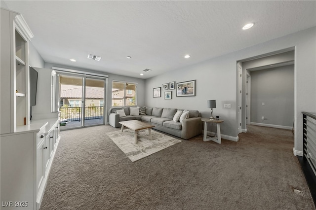 12665 Cooks Bay Ct, Las Vegas, NV 89141 - living room with recessed lighting, visible vents, baseboards, and dark carpet
