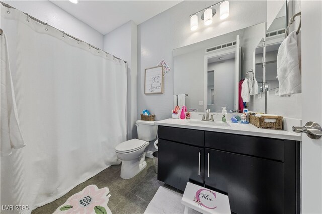 12665 Cooks Bay Ct, Las Vegas, NV 89141 - full bath featuring tile patterned flooring, toilet, curtained shower, and vanity