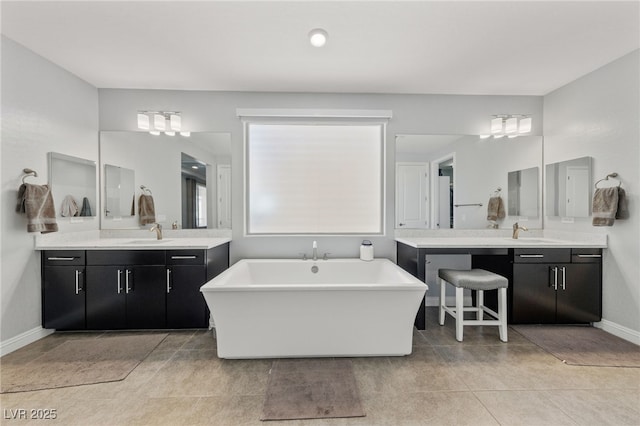 12665 Cooks Bay Ct, Las Vegas, NV 89141 - bathroom with a sink, tile patterned floors, two vanities, and baseboards