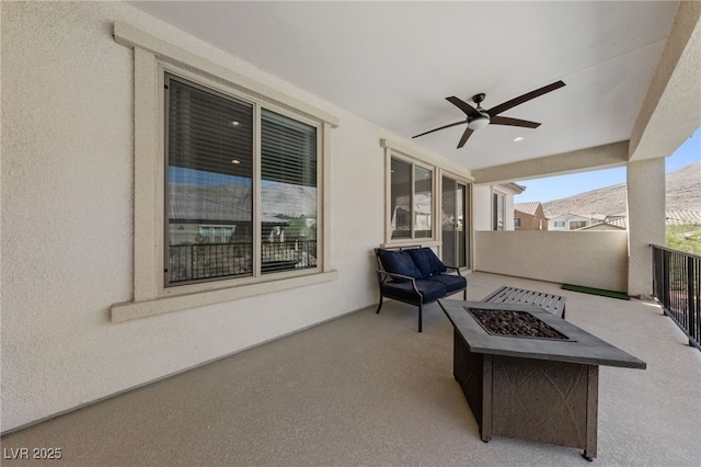 12665 Cooks Bay Ct, Las Vegas, NV 89141 - view of patio featuring a fire pit and ceiling fan