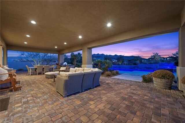 421 Foxhall Rd, Henderson, NV 89002 - view of patio / terrace with outdoor dining area, a swimming pool, and an outdoor living space