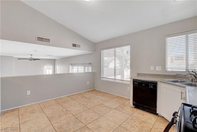 kitchen with white cabinets, lofted ceiling, visible vents, a sink, and black appliances