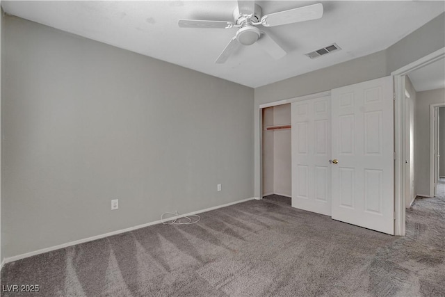 unfurnished bedroom featuring visible vents, a ceiling fan, a closet, baseboards, and carpet flooring