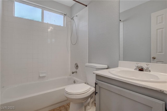 full bath with toilet, vanity, and shower / bathing tub combination