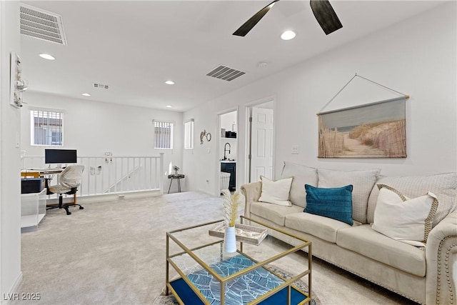 10052 Silver Comet Ct, Las Vegas, NV 89178 - living area with a desk, carpet flooring, plenty of natural light, ceiling fan, and recessed lighting