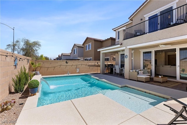 10052 Silver Comet Ct, Las Vegas, NV 89178 - view of swimming pool featuring a fenced backyard, a patio area, and outdoor lounge area