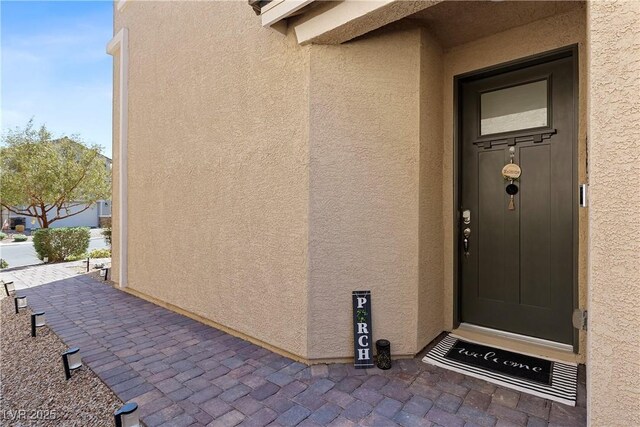 10052 Silver Comet Ct, Las Vegas, NV 89178 - property entrance featuring stucco siding