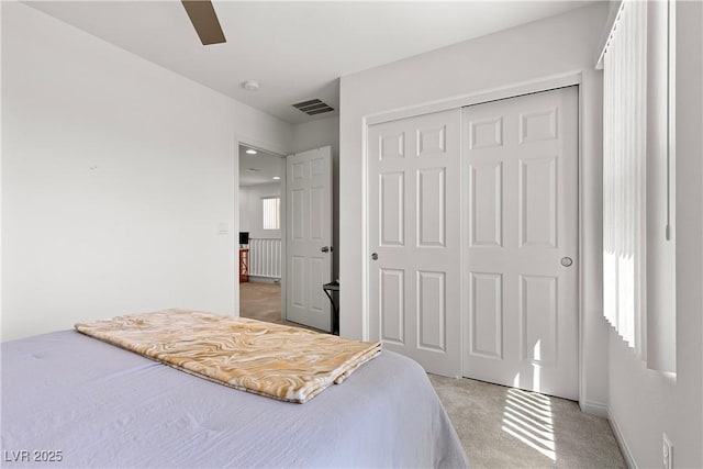 10052 Silver Comet Ct, Las Vegas, NV 89178 - bedroom featuring light colored carpet, a closet, ceiling fan, and baseboards