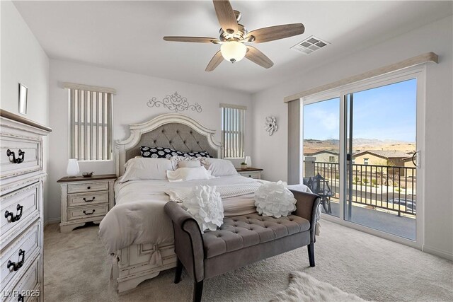 10052 Silver Comet Ct, Las Vegas, NV 89178 - bedroom featuring access to outside, light colored carpet, a ceiling fan, and baseboards