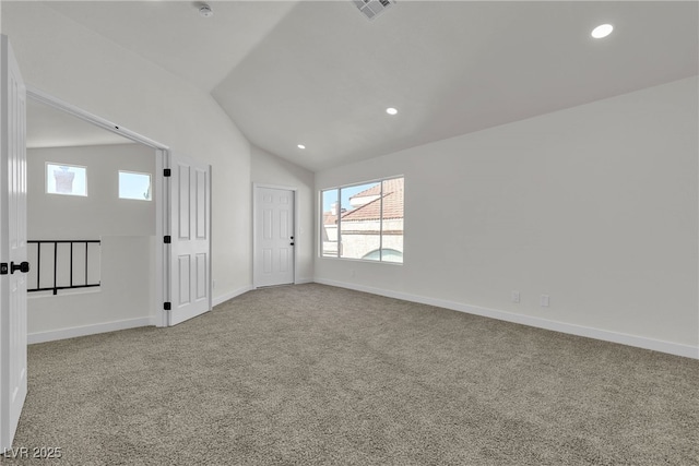 6509 Old Oxford Ave, Las Vegas, NV 89108 - unfurnished room featuring visible vents, lofted ceiling, plenty of natural light, and carpet floors