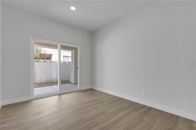 6509 Old Oxford Ave, Las Vegas, NV 89108 - empty room with baseboards, light wood finished floors, and recessed lighting