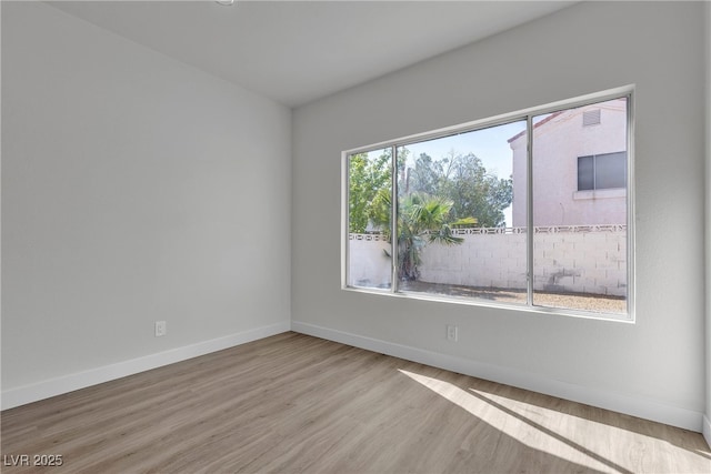 6509 Old Oxford Ave, Las Vegas, NV 89108 - unfurnished room with wood finished floors and baseboards