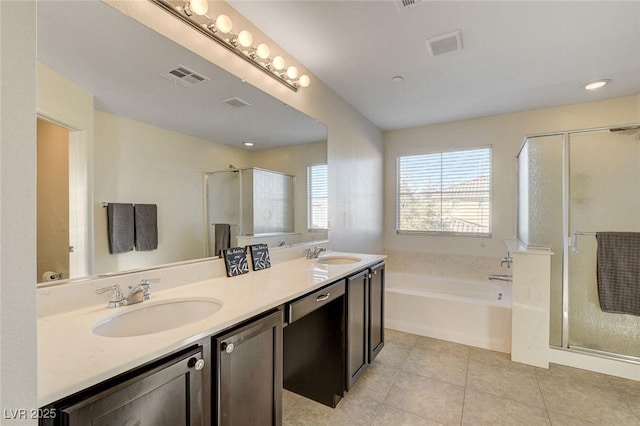 full bathroom featuring visible vents, a sink, and a stall shower