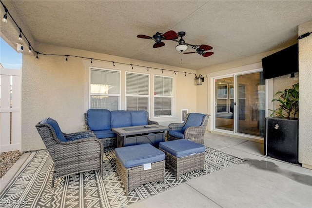 view of patio / terrace featuring an outdoor living space and ceiling fan