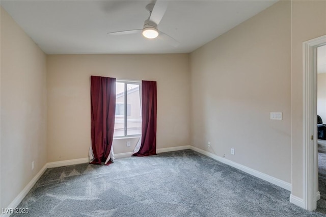 unfurnished room featuring baseboards, a ceiling fan, and carpet